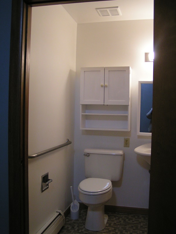 Large Unit Toilet and Cabinet Storage