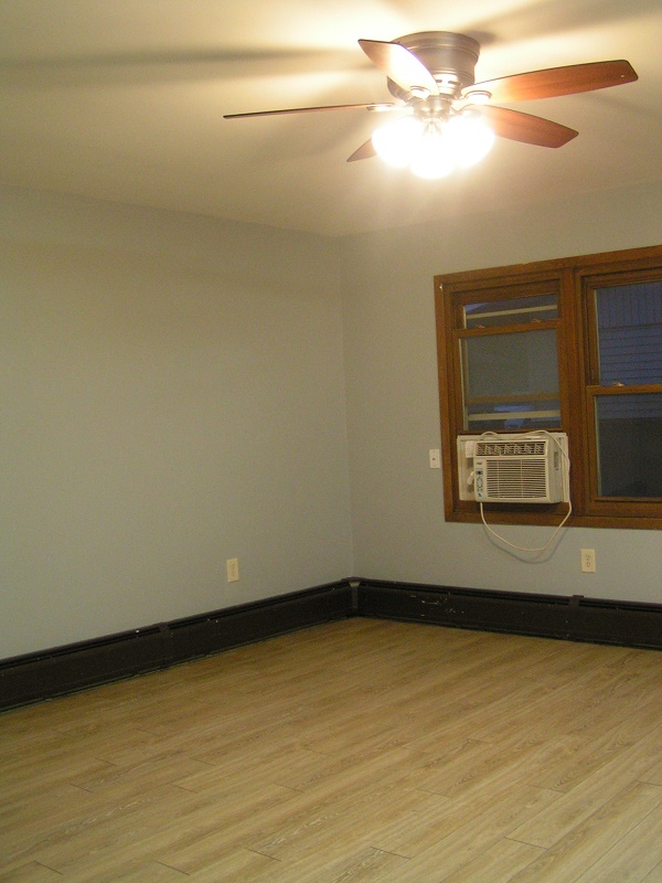 Large Unit Living Room with Window Air Conditioner