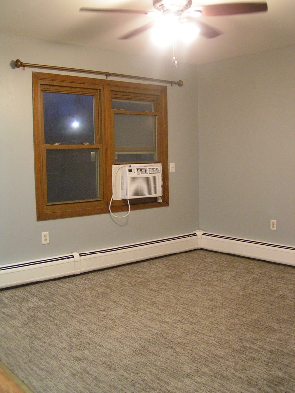 Small Unit Living Room with Window Air Conditioner